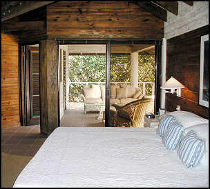 North Beach Cottage bedroom and private terrace.