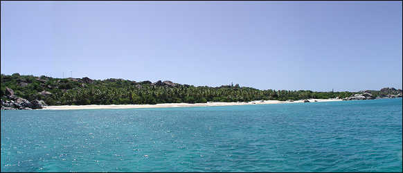 The long white sand beach near the Baths