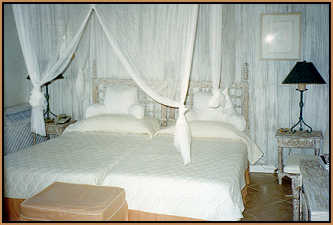 Cotton House bedroom with twin beds