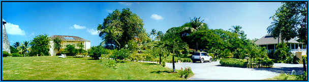 The pool terrace and cottages are on a hill behind the jeep, the Cotton House Club is on the right.