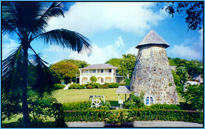 Old sugar mill (now a gift shop) the focal point of Cotton House Resort