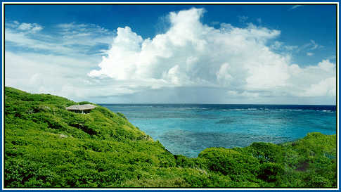 hillside cottage overlooking the beach below