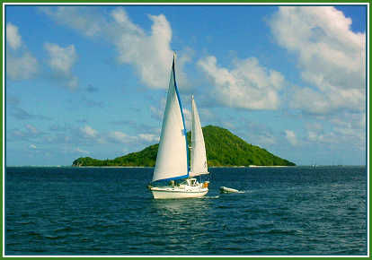 sailboat with PSV in the distance