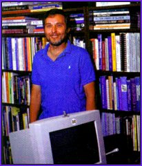 Photo of Larry Harris Taylor in his library