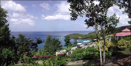 View from hillside cottage overlooking the pool deck and dining room