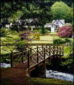 bridge over stream to main house