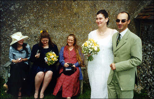 Kara and Nick leaving the church - Mariko, Betsy, and Katherine on bench