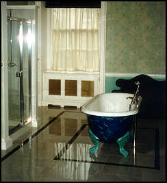 Suite #4 - huge bathroom with footed tub in the middle