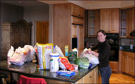 Groceries being delivered and put into our cabinets