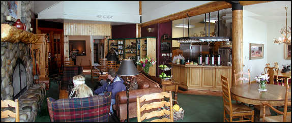 Rusty Parrot living area with dining tables and refreshment bar