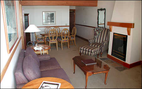 Suite living room, dining room which faced a large balcony