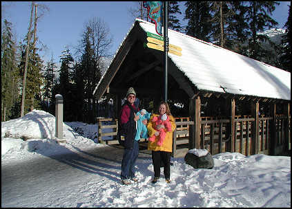 Jeff, Katherine, and their twin at the Covered Bridge connecting upper Village with lower Village