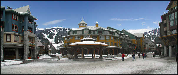 Village Plaza with view of Blackcomb on left and Whistler Mountain on right